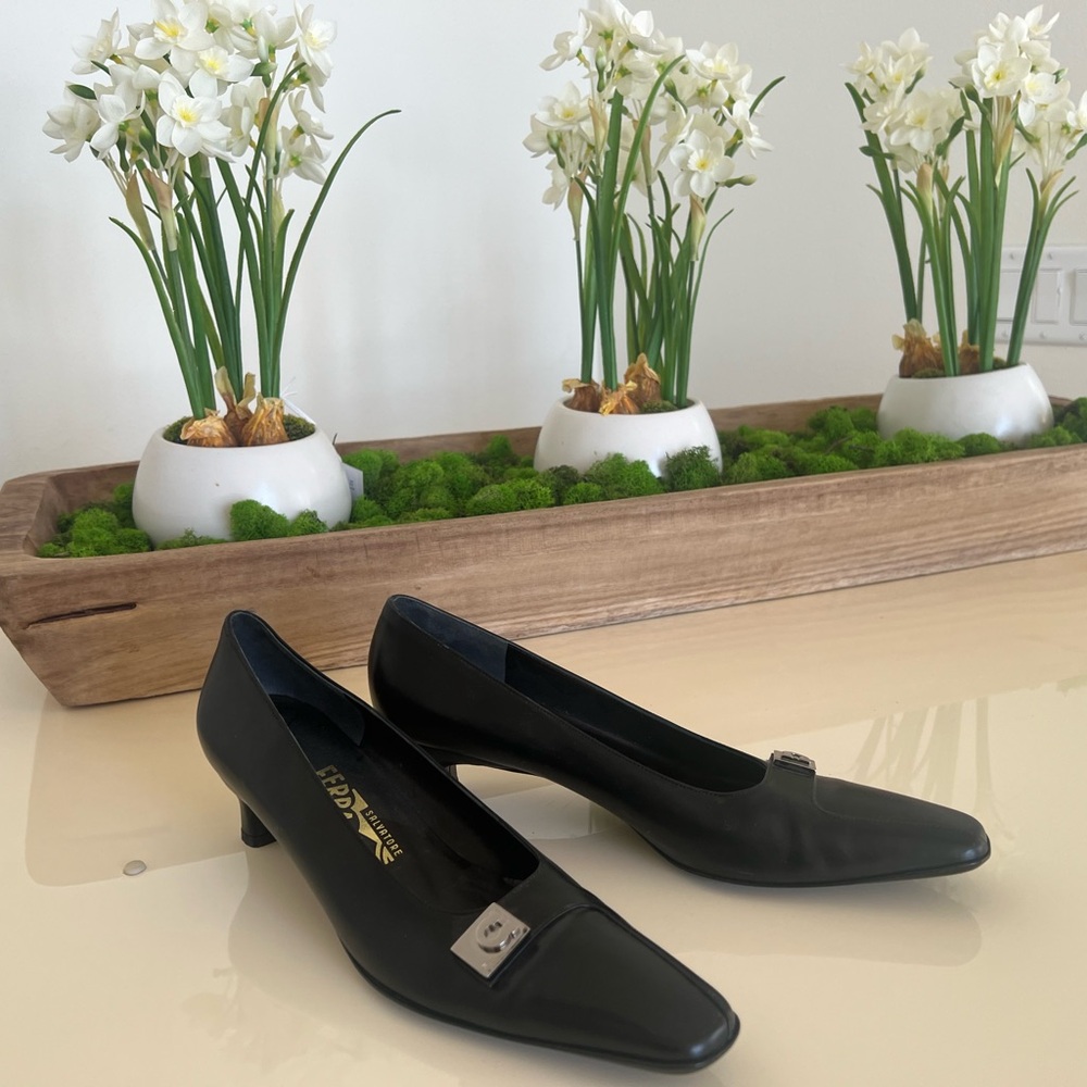 Ferragamo black heels with silver hardware size 8 AA 
narrow.